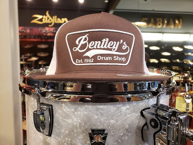 Bentley's Drum Shop Trucker Snapback Hat in Brown and White